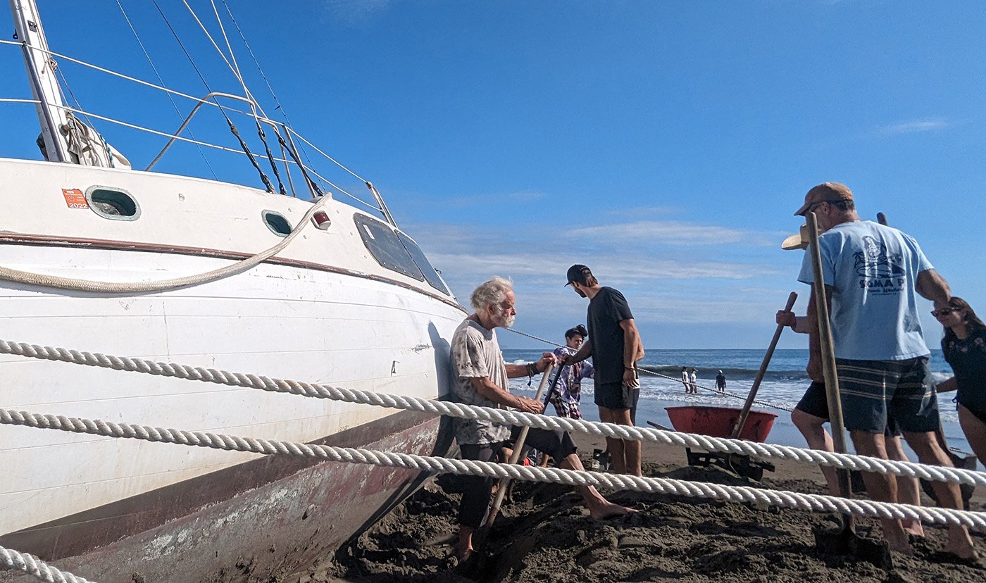 Bob Weir, the beached sailboat, and an ebbing tide