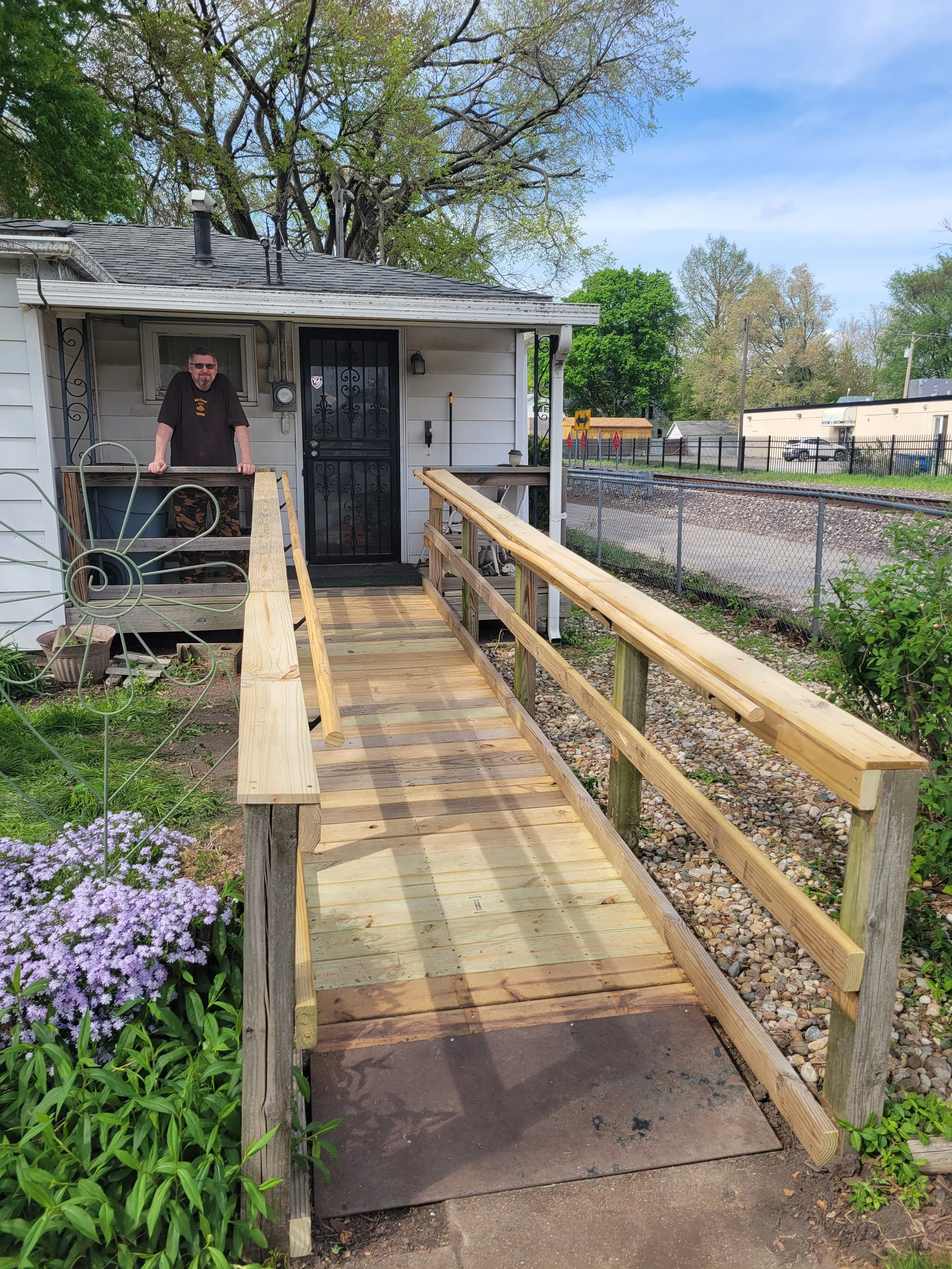 New wooden wheelchair-accessible ramp. Exterior carpentry. Springfield, IL