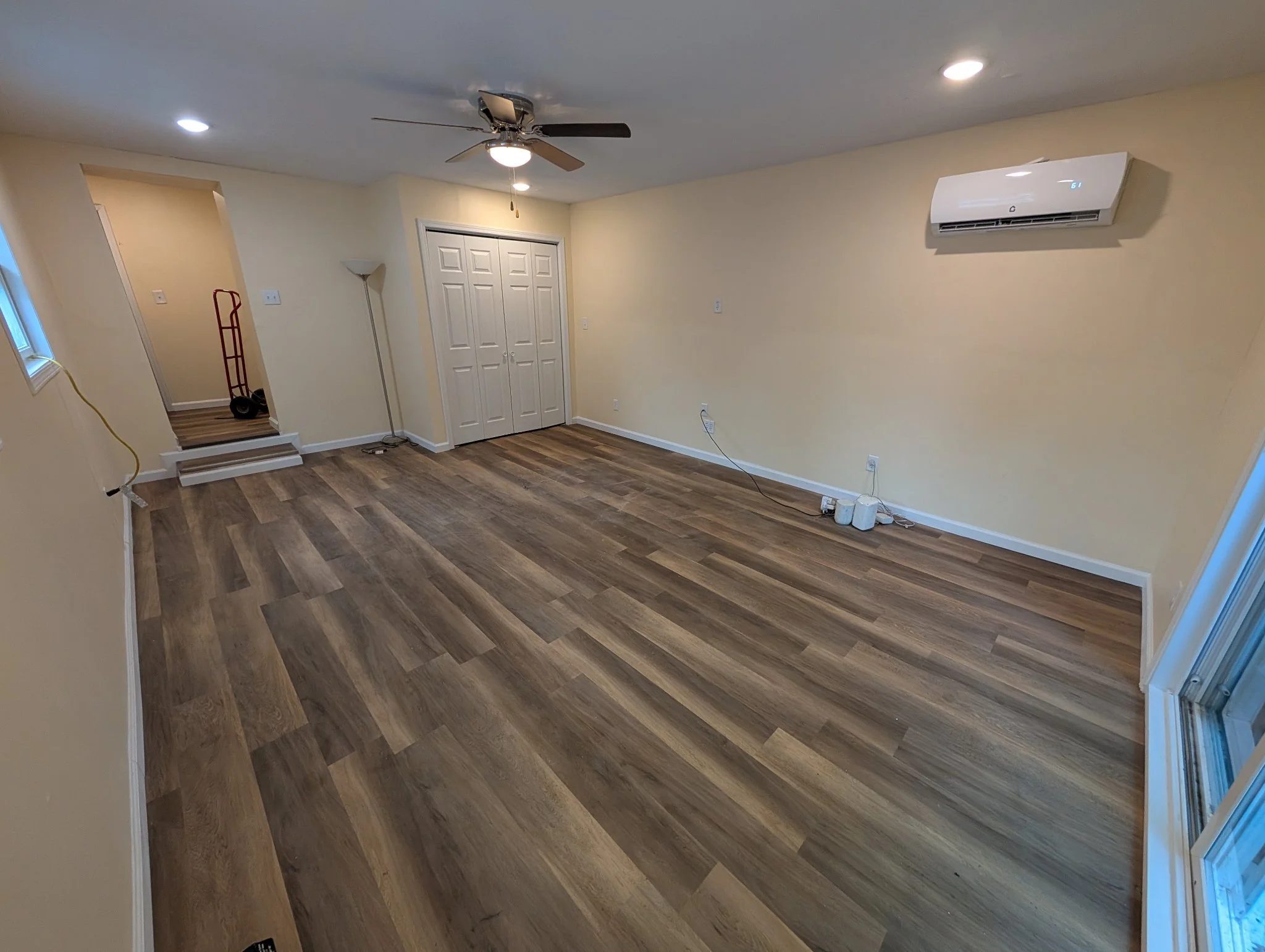 Finished living room with LVP flooring, Springfield IL