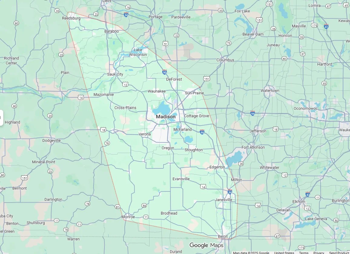 Map of Madison, Wisconsin and surrounding areas showing city streets, highways, lakes, and nearby towns.