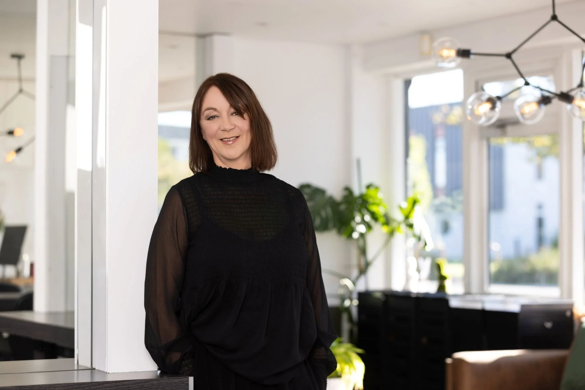 Picture of Jacqui Gavin, Independent Stylist, smiling in the salon