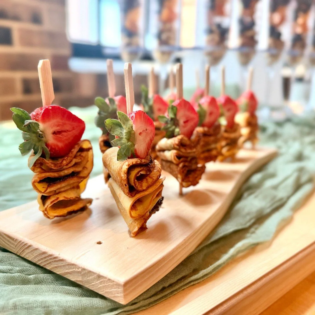 Meet the crowd favorite. 🍓✨ Our mini crepe skewers are delicate crepes layered with Nutella and topped with a fresh strawberry, all in one mess-free bite.

Add them to your next shower, brunch or cocktail hour, or send them as a gift. Our crepe skew