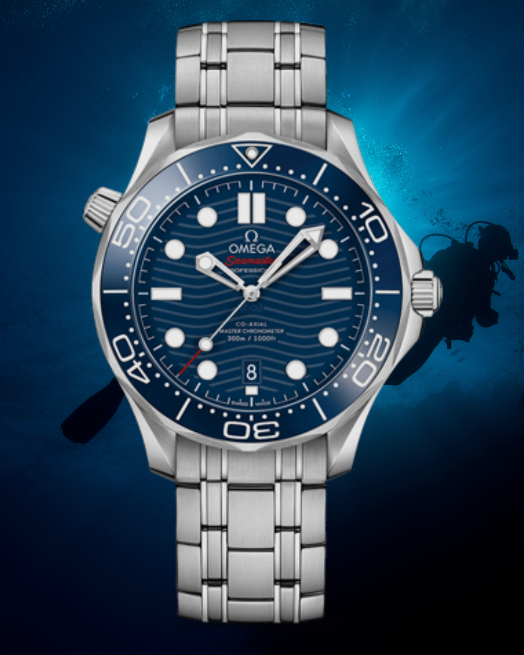 A close-up view of an Omega Seamaster professional diver's watch with a blue dial, silver bracelet, and a background featuring a scuba diver underwater.