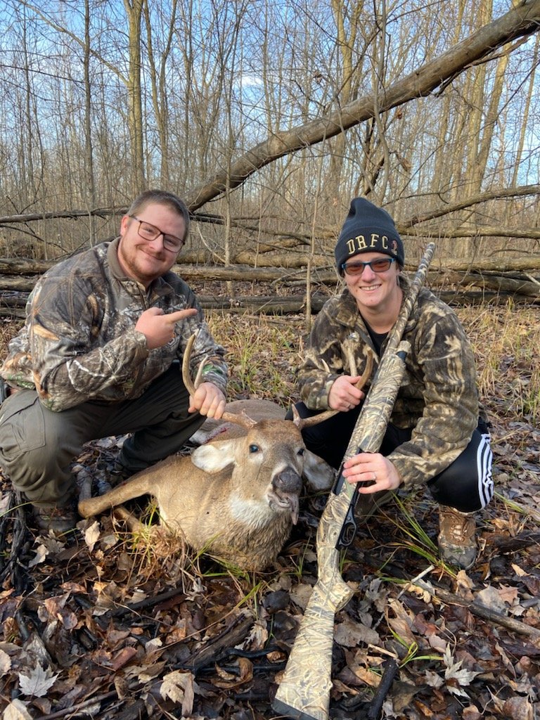 Family-supported Michigan deer hunt reflecting ethical practices and shared outdoor values.