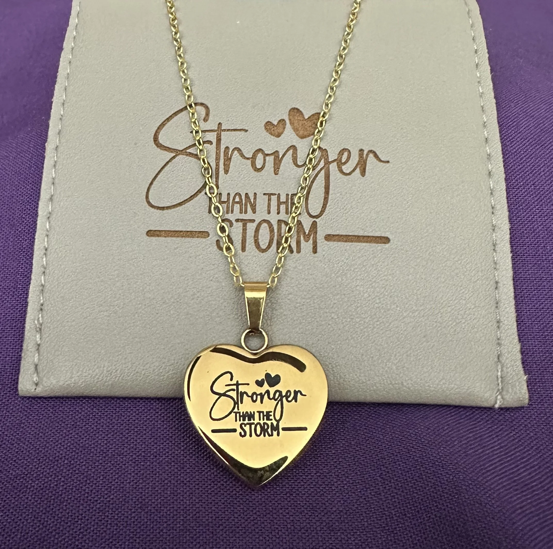 Engraved Heart Necklace – “Stronger Than the Storm”