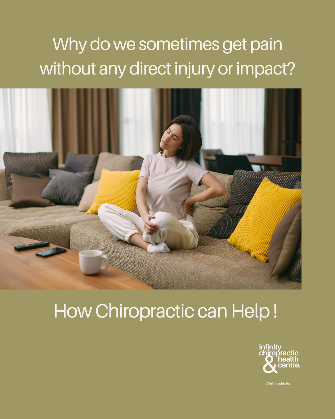 A woman sitting on a sofa in a living room holding her lower back in pain, with a concerned expression. The room has several pillows and a coffee table with a mug and remote controls. The text addresses pain without injury and suggests chiropractic h