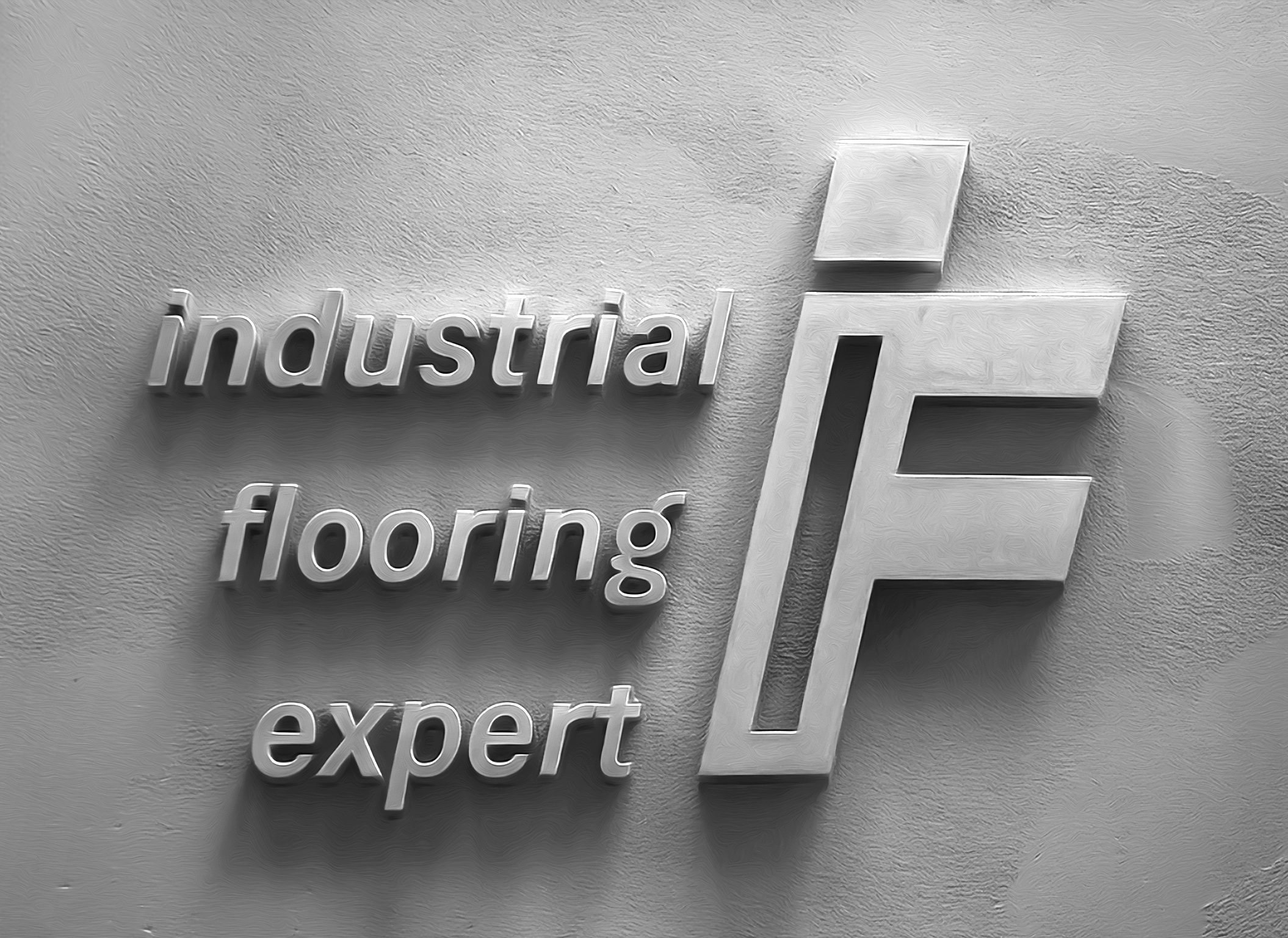 3D sign on wall for Industrial Flooring Expert, featuring large logo with the words 'industrial', 'flooring', and 'expert' arranged vertically.