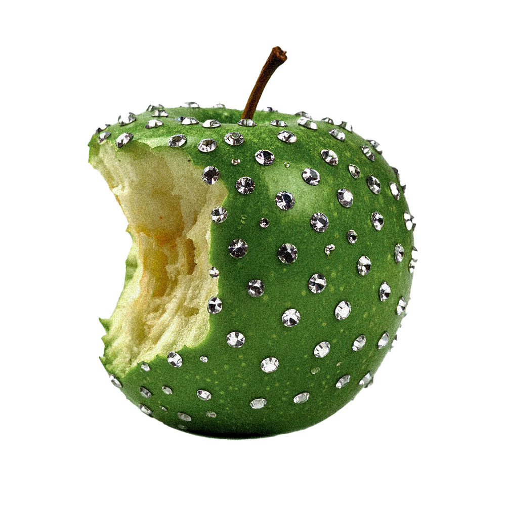 Green apple with diamond-like embellishments and a bitten section