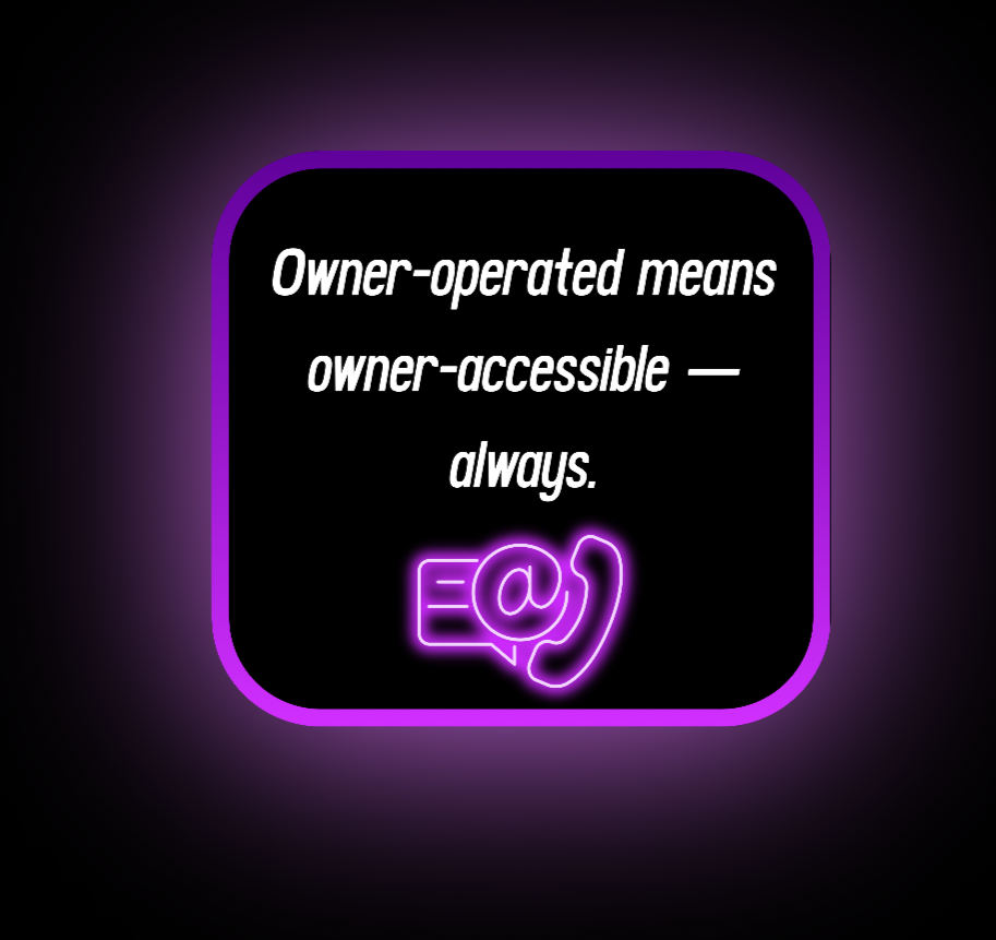 Neon sign with white text on a black background reading 'Owner-operated means owner-accessible — always.' and a purple neon icon of an email, at symbol, and telephone.