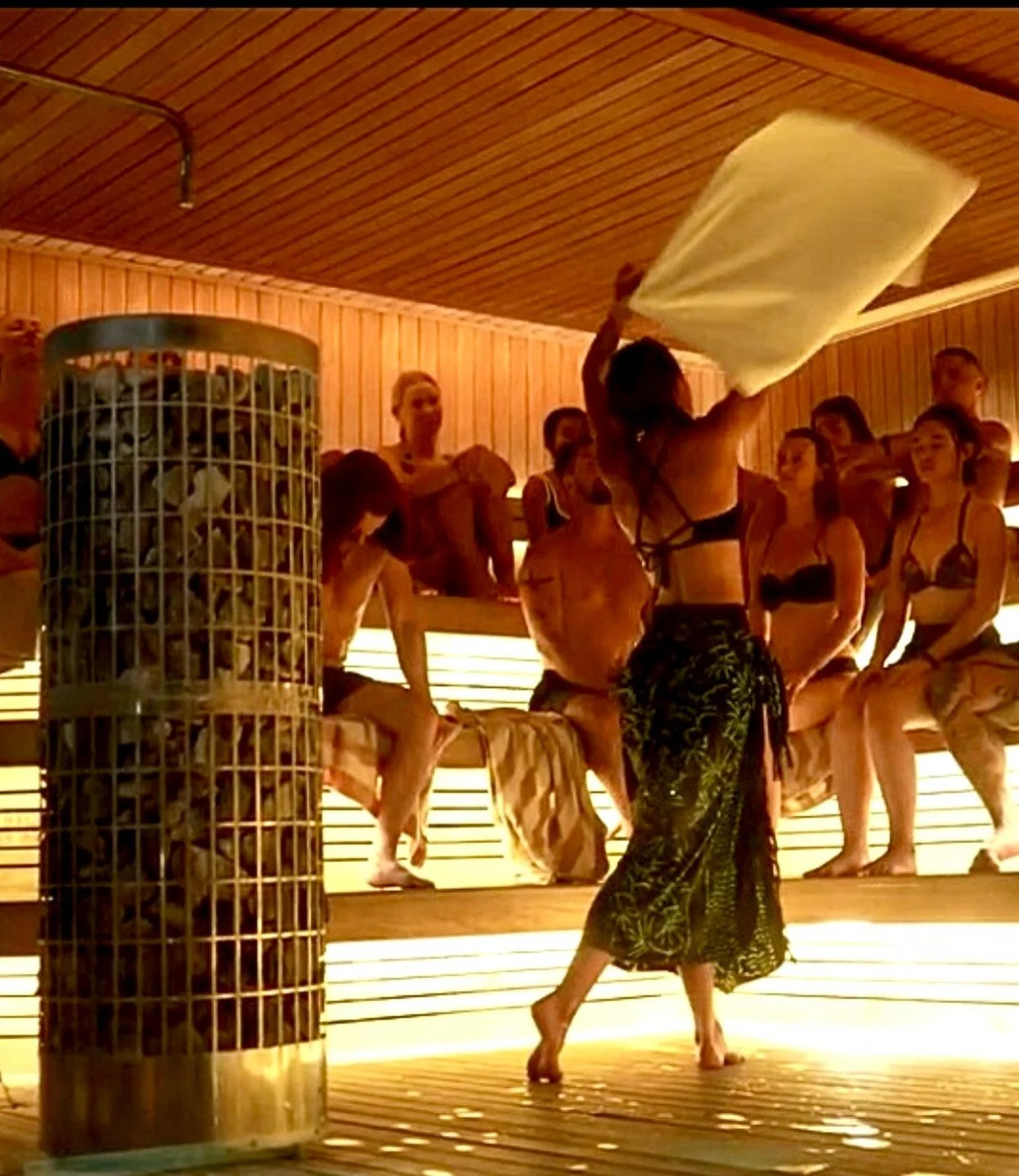 The towel isn&rsquo;t for drying off.
We use them to circulate the hot air and infused essential oils throughout the room. The top of the sauna holds the hottest air, and with each controlled movement, that heat is brought down toward the body so eve