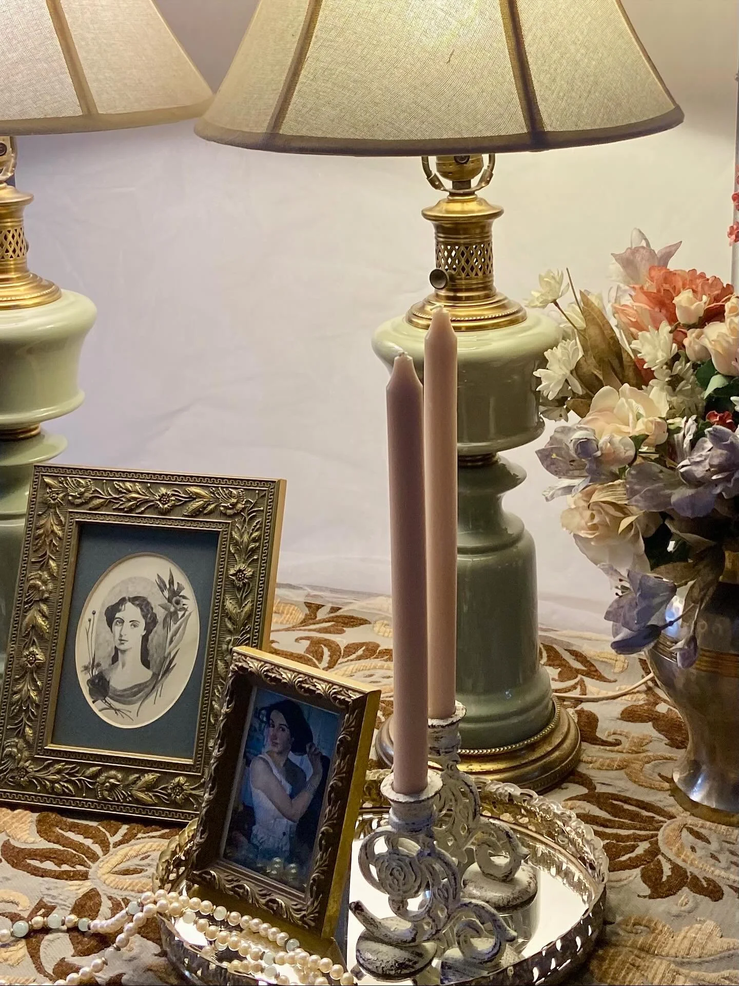 Two lamps, two candle holders, two beautiful women, framed in two golden frames. All that&rsquo;s missing from this scene, is a fireplace and cat on my lap. 😊

A. Exquisite pair of vintage Stiffel celadon green glazed porcelain table lamps with bras