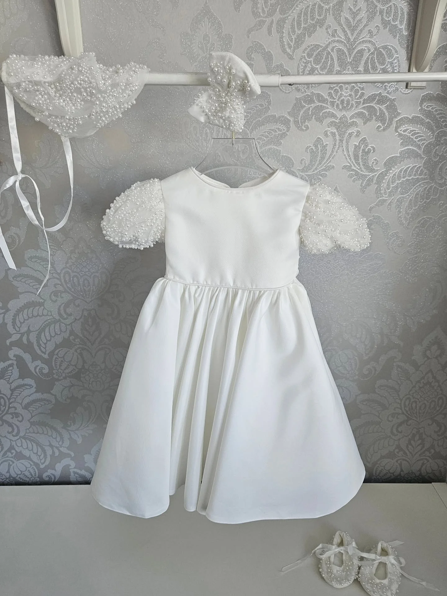 🤍✨🤍
Taking a moment for this beauty - our Paige Pearl Mikado Satin Dress 🤍

A vision of grace and timeless beauty 🤍

It makes a perfect Christening / flower girl dress. Crafted from the finest fabrics and pearls that have been embellished by hand