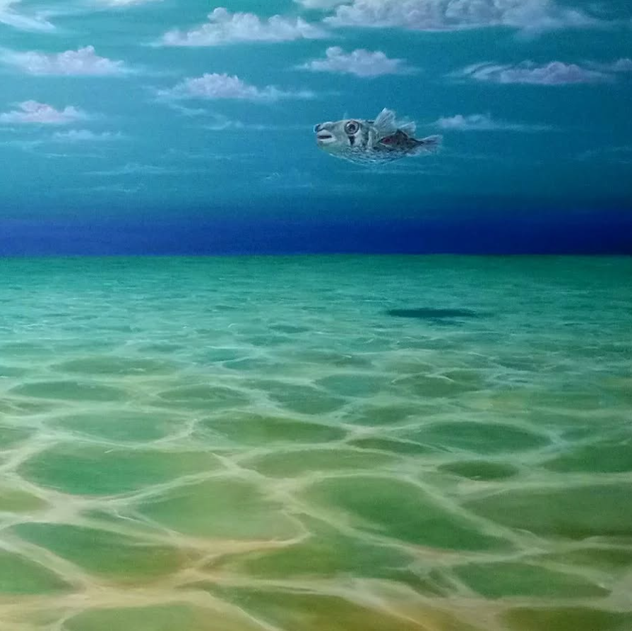 A surreal image showing a fish swimming in the sky above the ocean, creating the illusion of a fish in the air over the water.