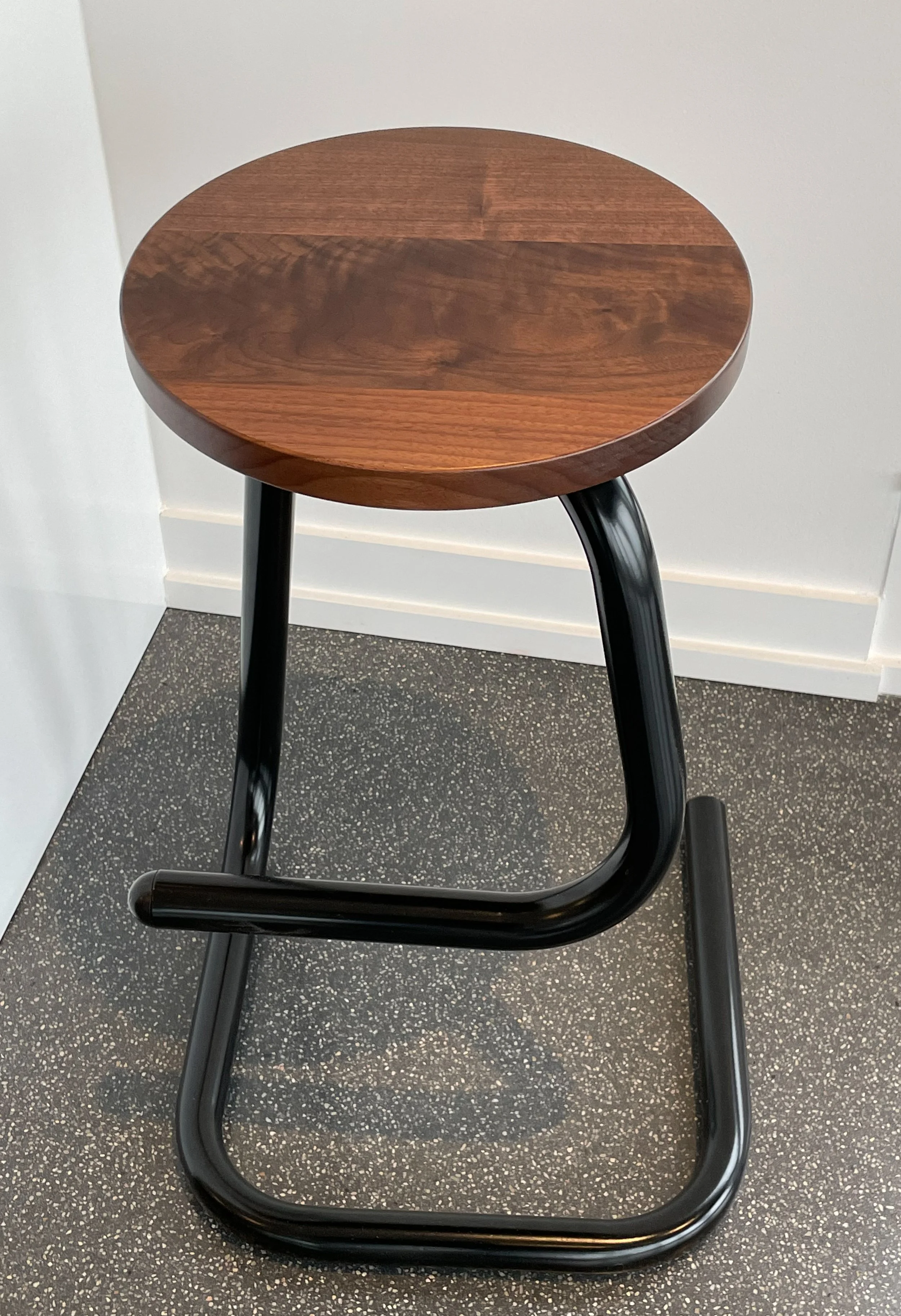 Custom stool with tubular base 