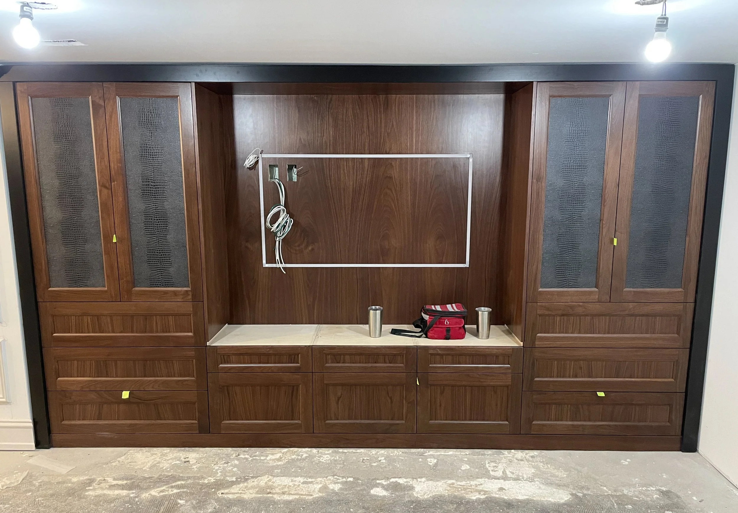 Custom dark wood TV wall 