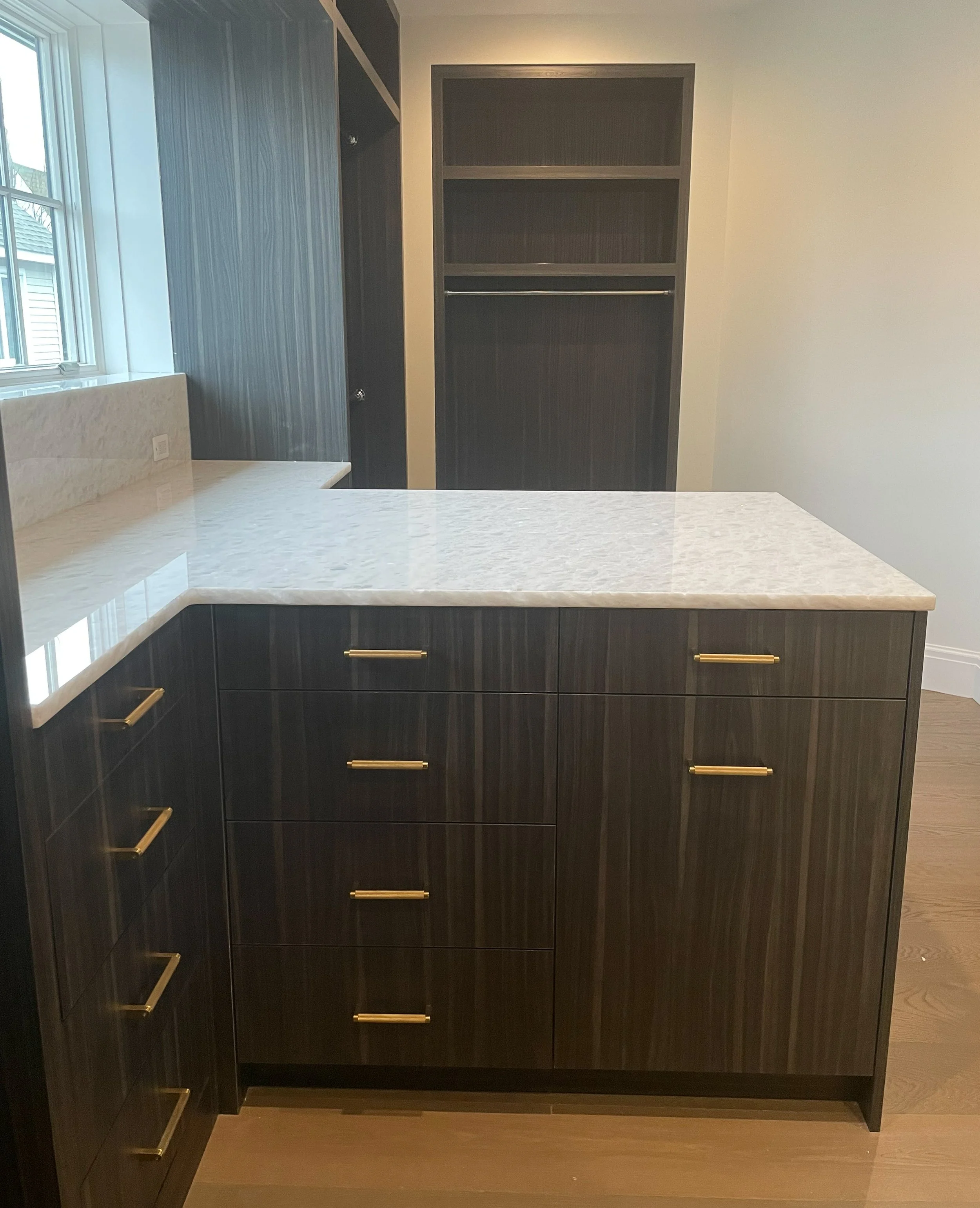 Modern dark laminate closet peninsula