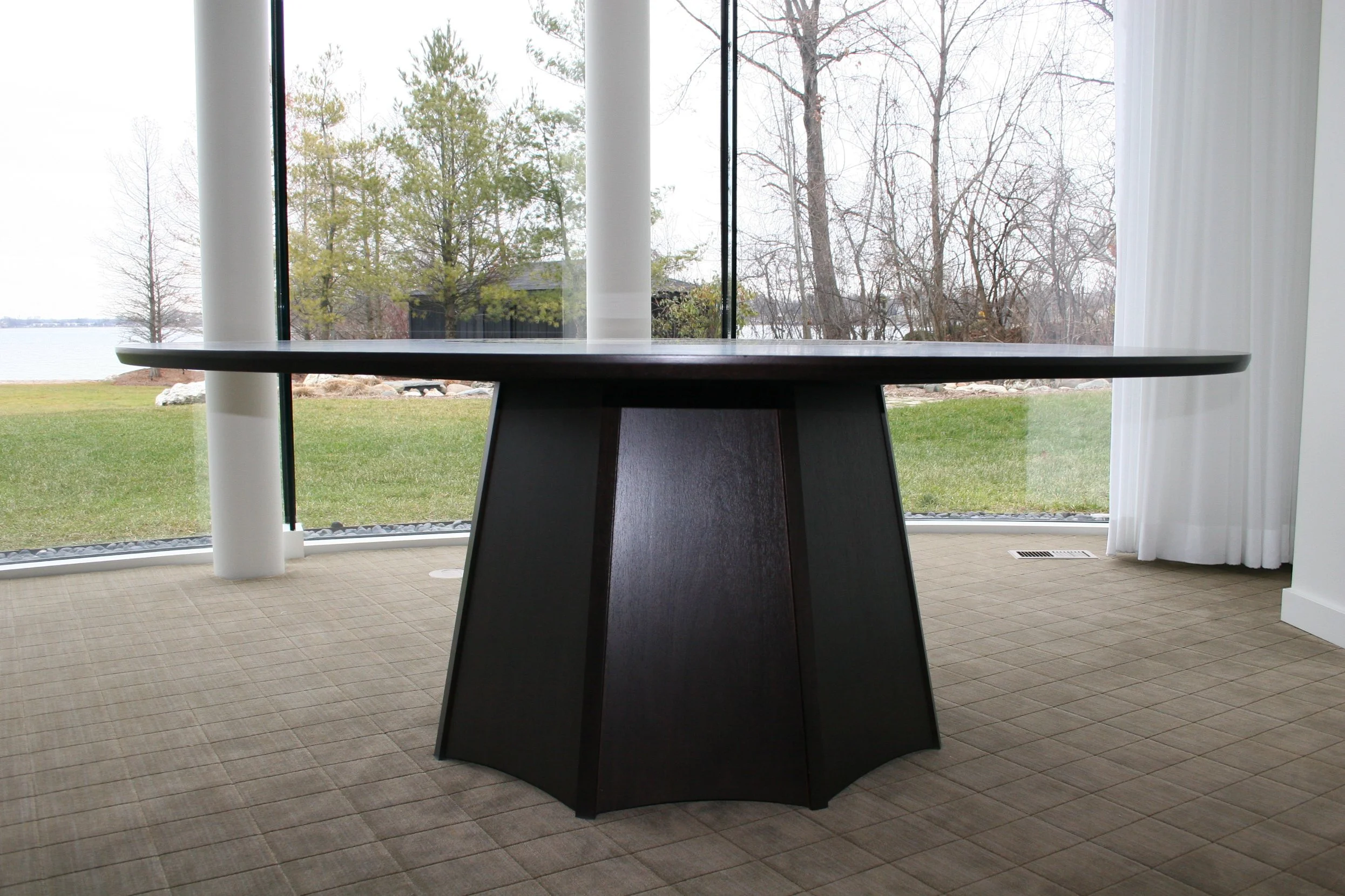 Custom pedestal dining table with fluted base