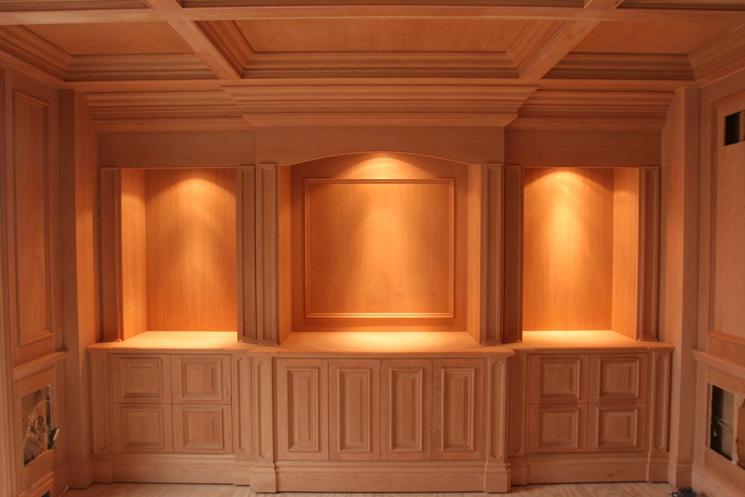 Custom wood paneled room and coffered ceiling