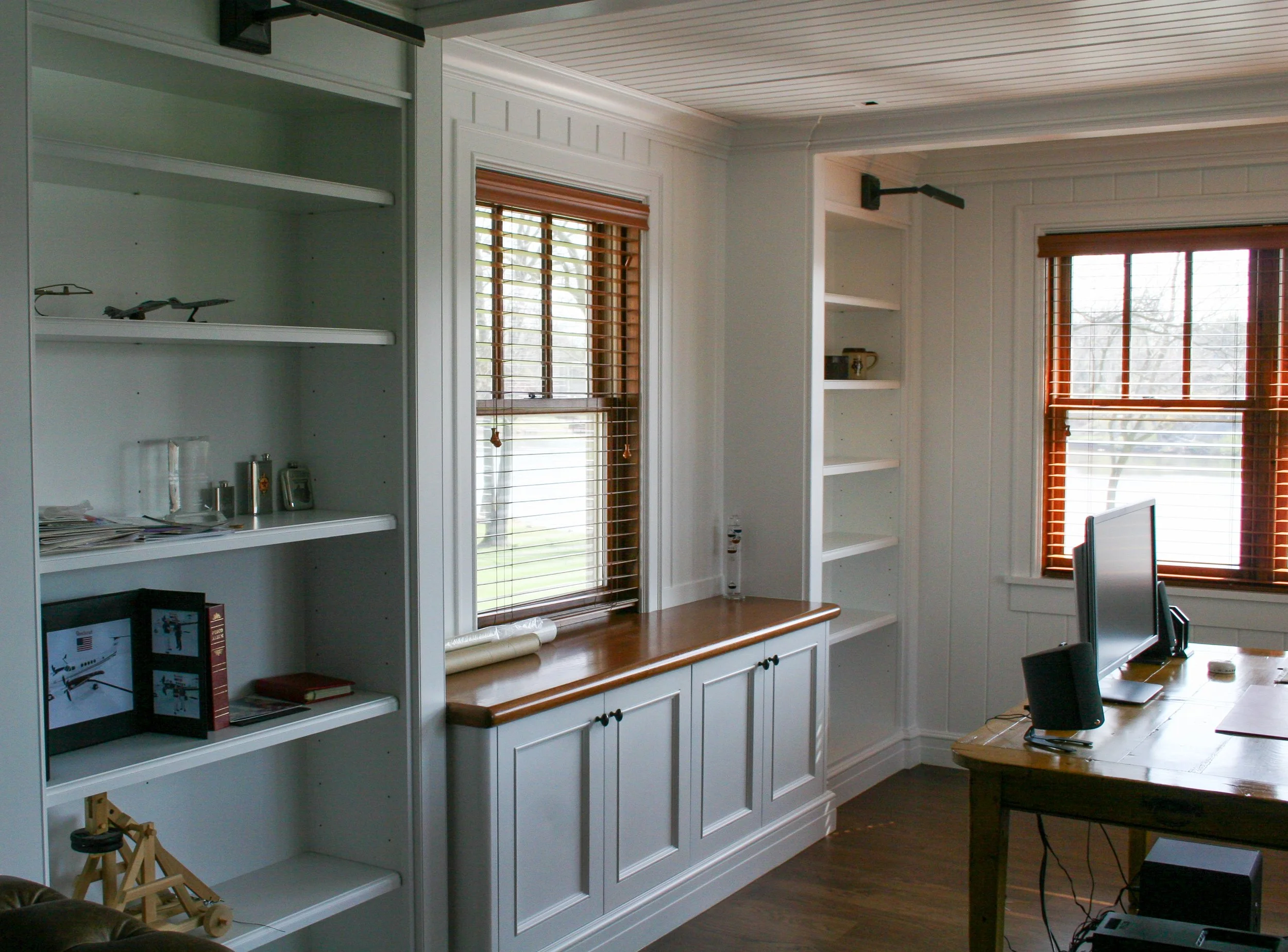 White home office with wood top
