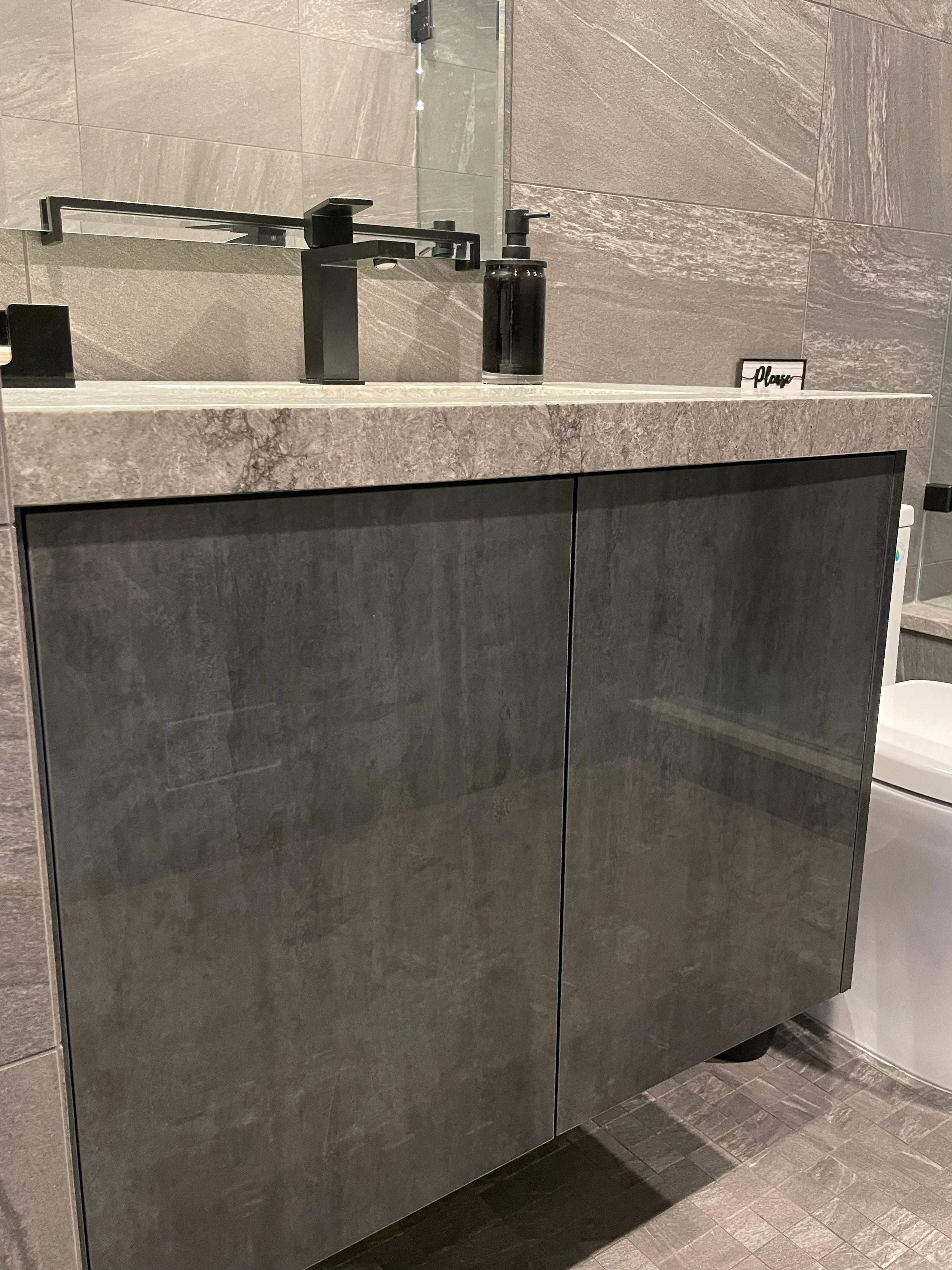 Custom high gloss vanity with full height doors 