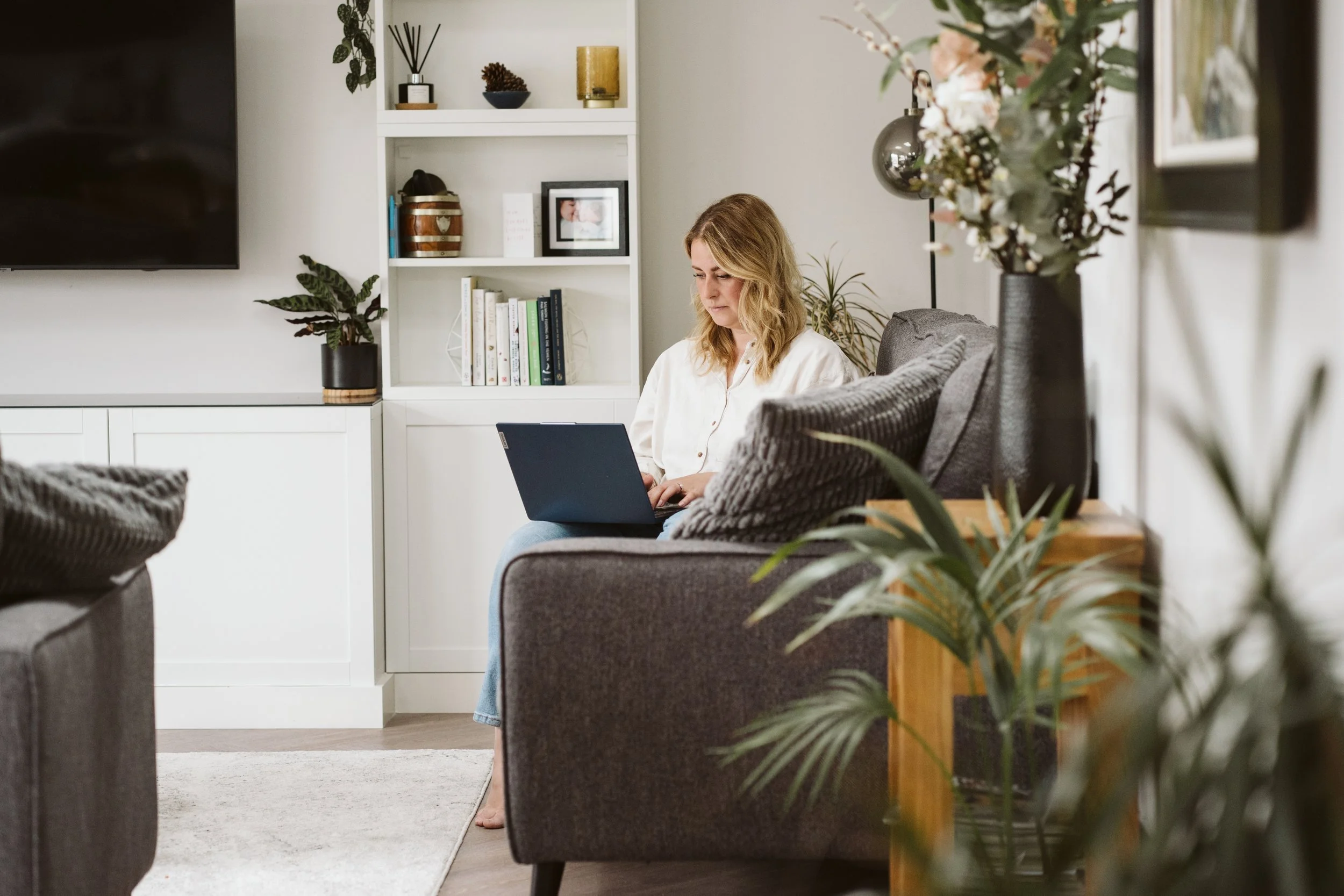 Mum working with her child at home