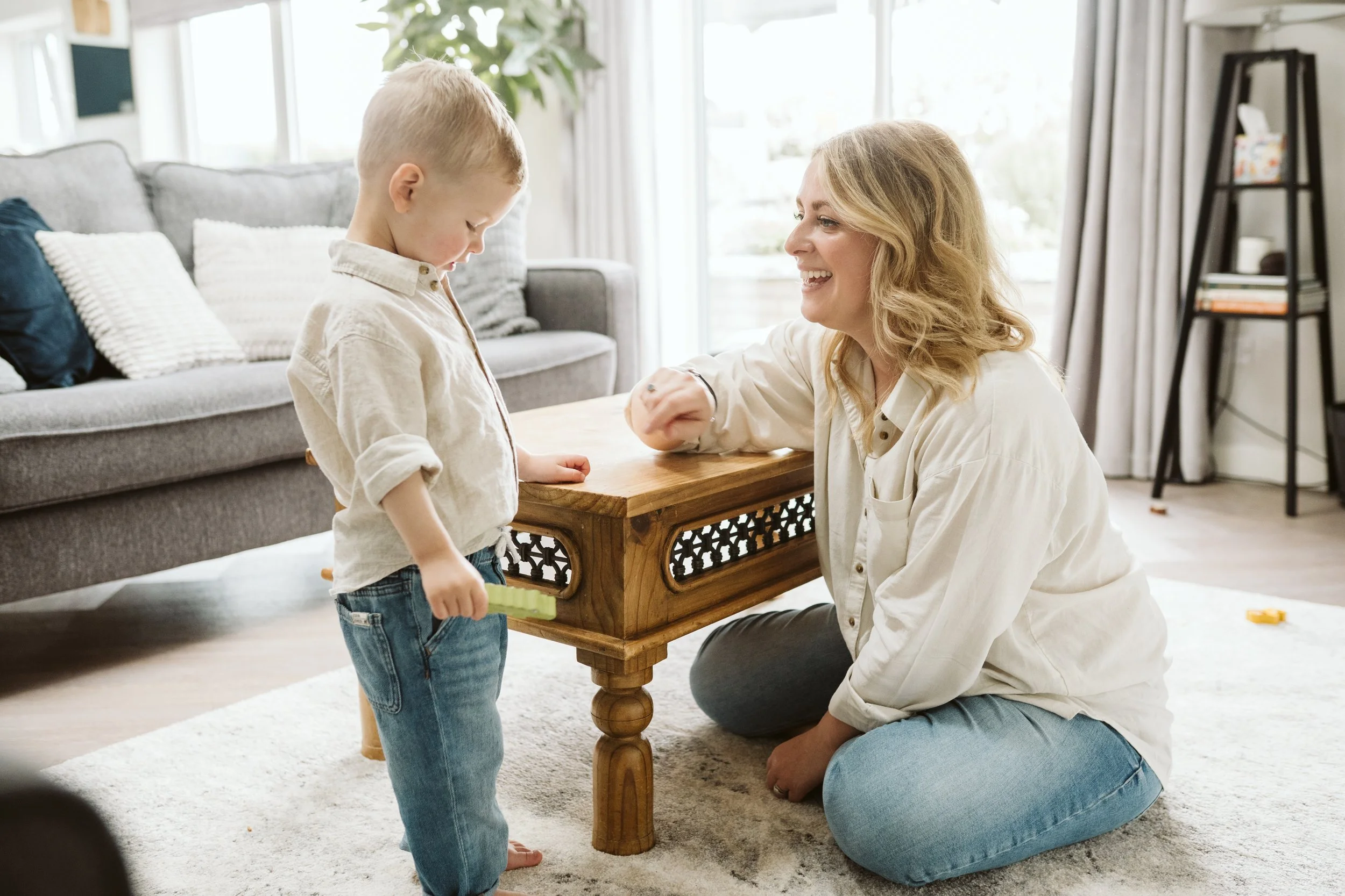 Mum and child talking together at home
