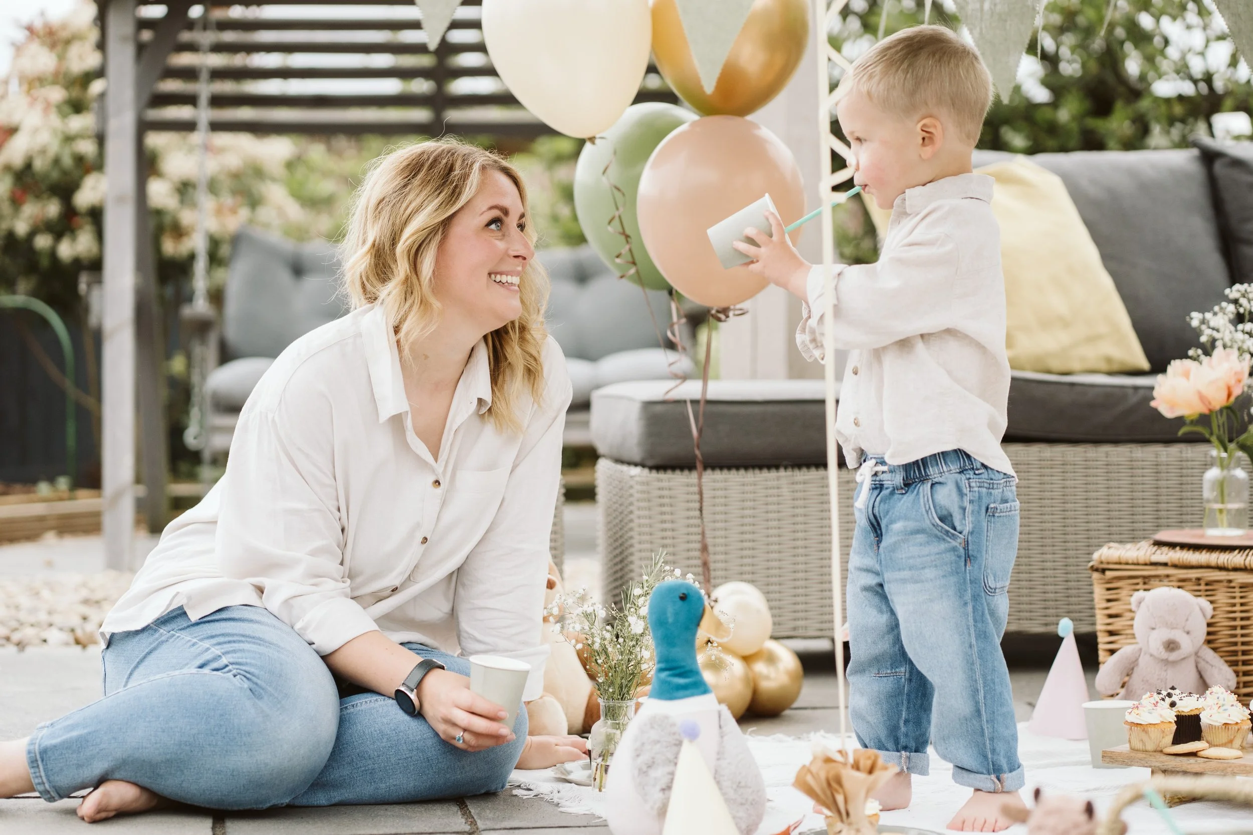 Mum and child celebrating together at an outdoor party