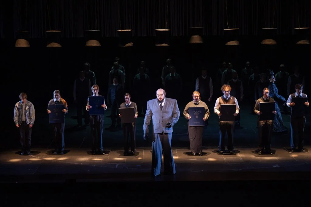 Martin Iivarinen in his role as Asuntolan opettaja in the opera Ovllá, 2026.