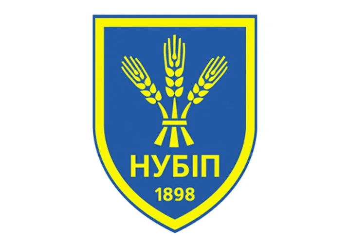 A shield-shaped emblem with a dark blue background and a yellow border. Inside, there are three yellow wheat stalks tied together. The text "НУБІП" and the year "1898" are written in yellow.