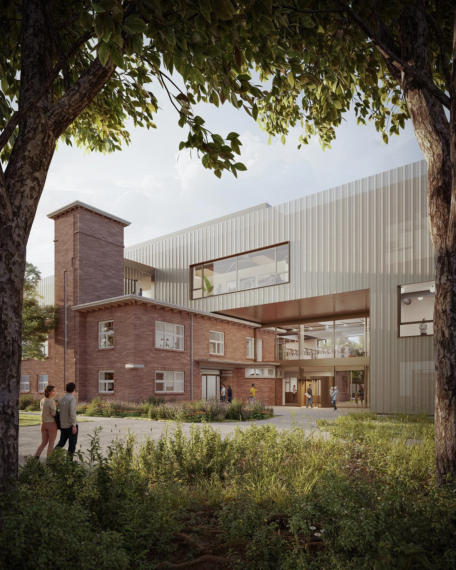 Modern architectural building combines brick and metal siding, with large windows and an entrance area, surrounded by trees, grass, and people walking and talking outside.