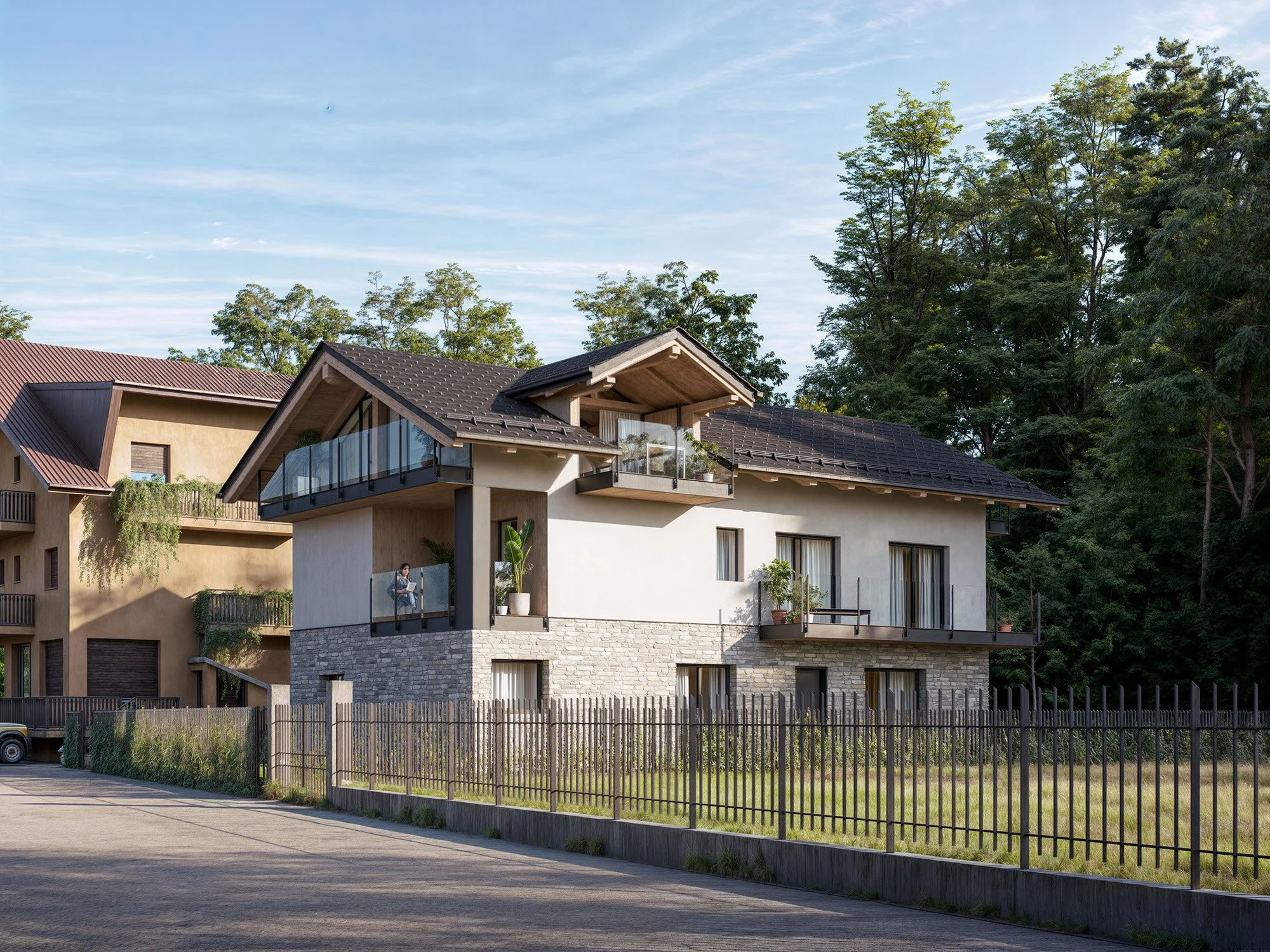 Modern multi-story house with a stone and white exterior, multiple balconies with glass railings, situated near greenery and trees.