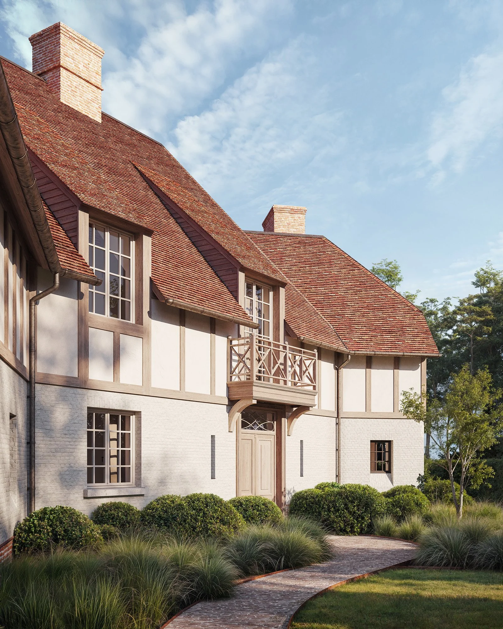 Front view of a charming house with a red tile roof, white brick walls, large windows, a small balcony, surrounded by landscaped bushes and a curved stone pathway, under a partly cloudy sky.