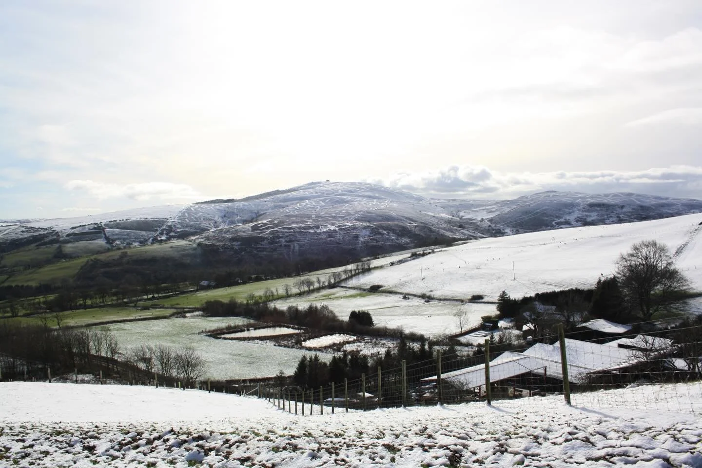 A snowy Moel Famau in the lovely winter sunshine today ❄️ 
Found a new route today from Cilcain to Moel Arthur, with beautiful views of the surrounding hills and across to the Wirral.

#moelfamau #northwalesphotography #northwales