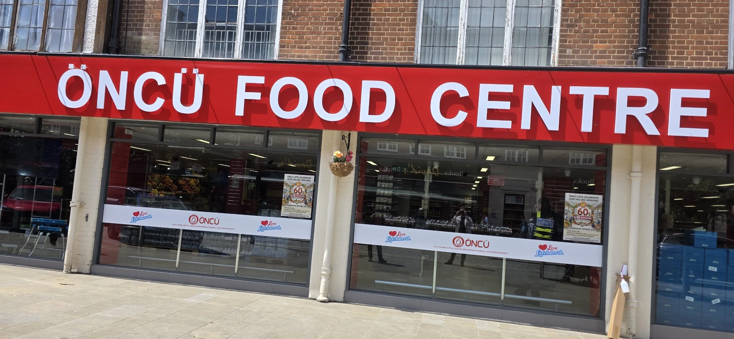 Shop signwriting large sign and window graphics Letchworth Hertfordshire