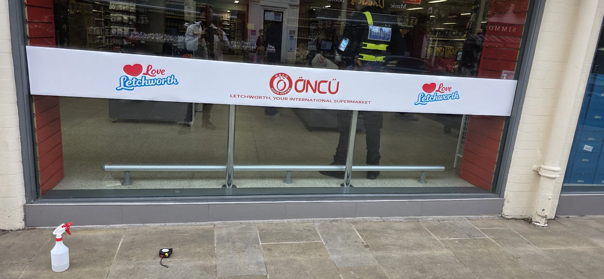 Shop signwriting large sign and window graphics Letchworth Hertfordshire