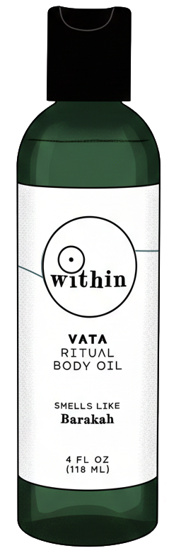 A green bottle of Within VATA Ritual Body Oil with a black cap, label indicating it smells like Barakah, 4 fluid ounces.