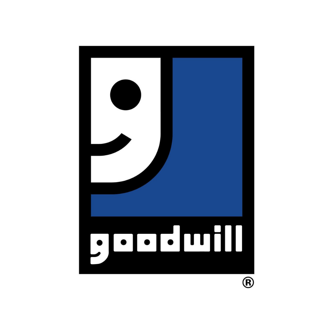 Logo of the company 'Goodwill' featuring a smiling cartoon face with the word 'goodwill' underneath.