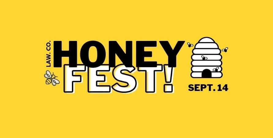 Yellow poster advertising Honey Fest on September 14 with a beehive illustration and a honey bee.