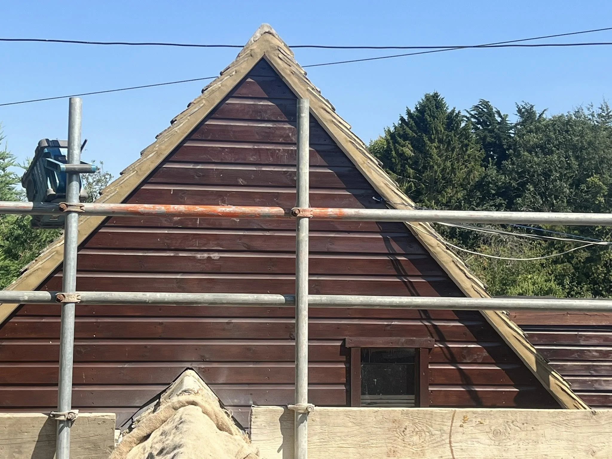 Ridge tile pointing and verge renewal