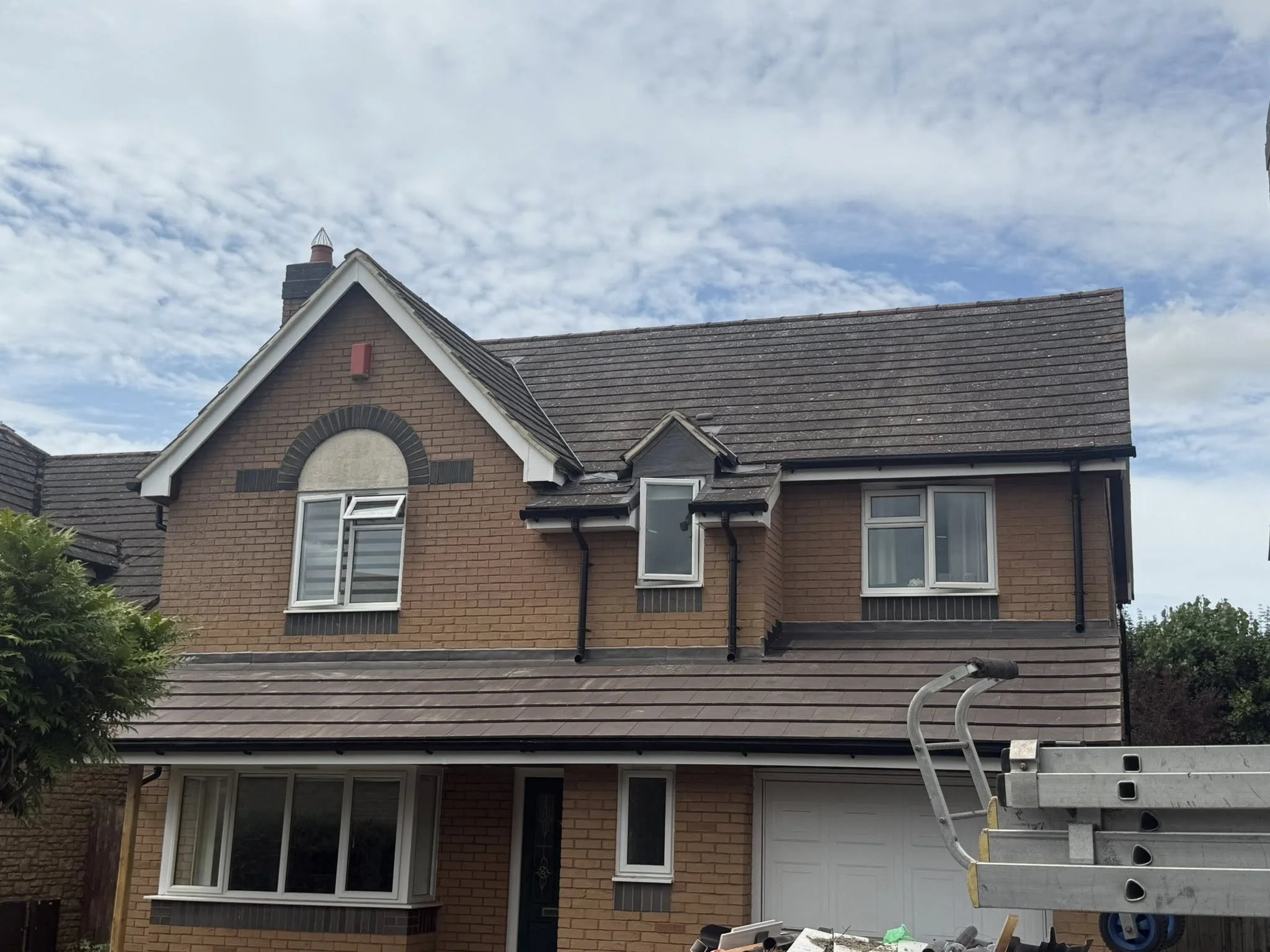Front Re-roof, fascia and guttering replacement all around property and tile vents fitted