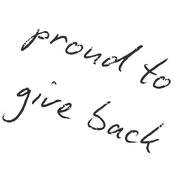 Text says "proud to give back" written in black cursive on a transparent background.