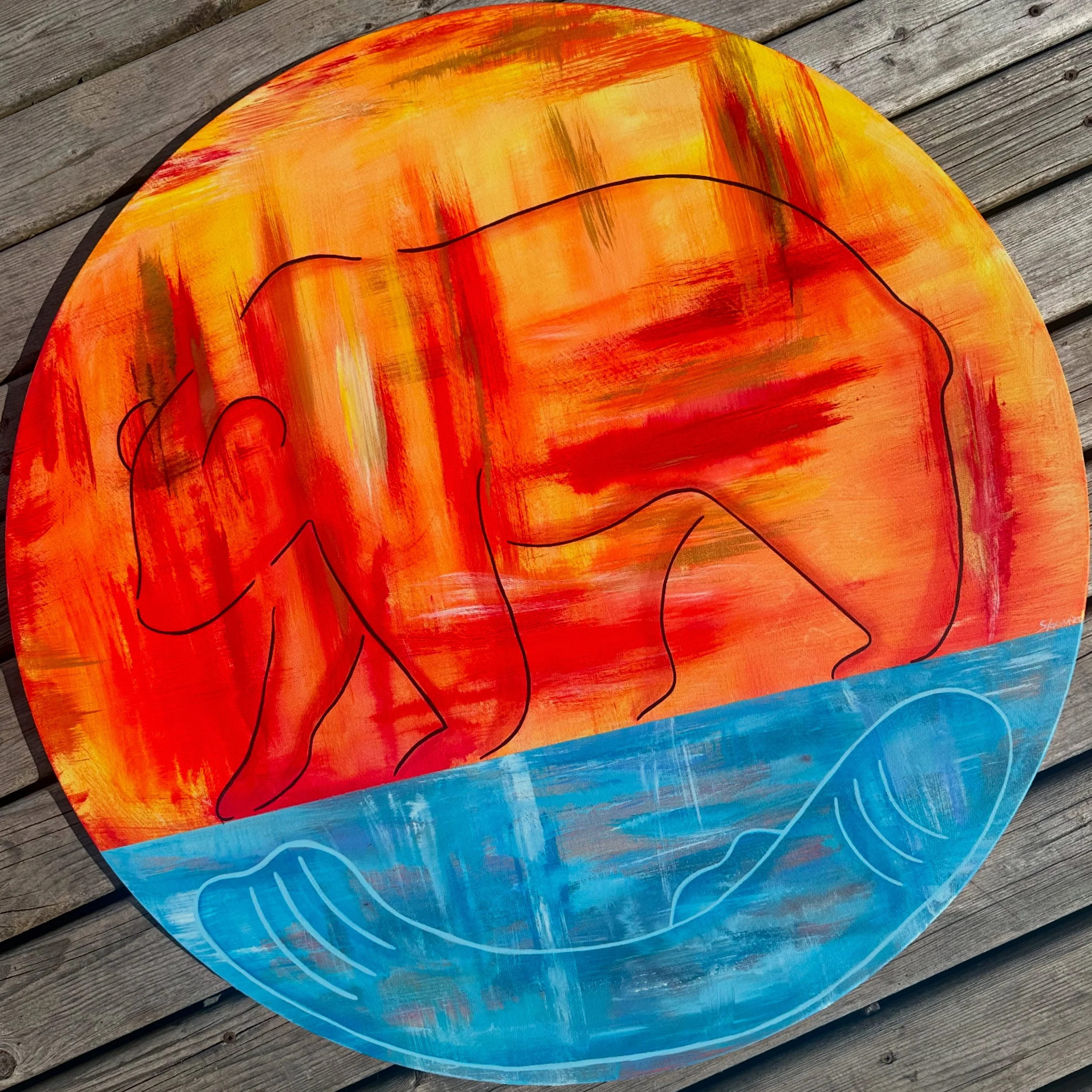Circular painting of a fish and bear stylized, abstract art style with bold brushstrokes, and the background features bright orange and yellow colors above water, and blue below water, representing the ocean.