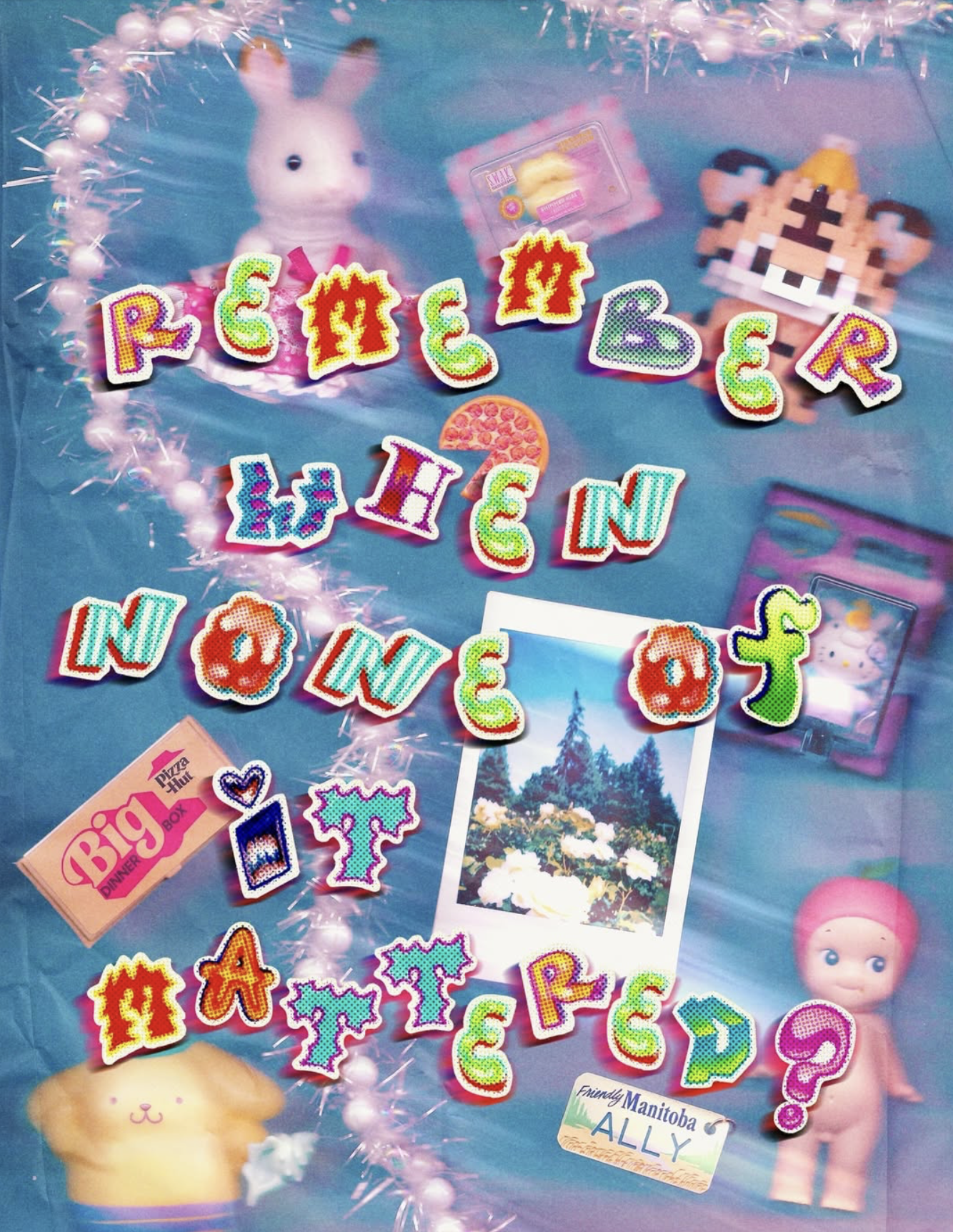 Colorful birthday decoration with letter banners spelling 'RESERVED' and 'HERC' on a blue background. Includes plush toys, a photo of a nature scene, and various small items like a toy pig and a pin with 'ALY' on it.