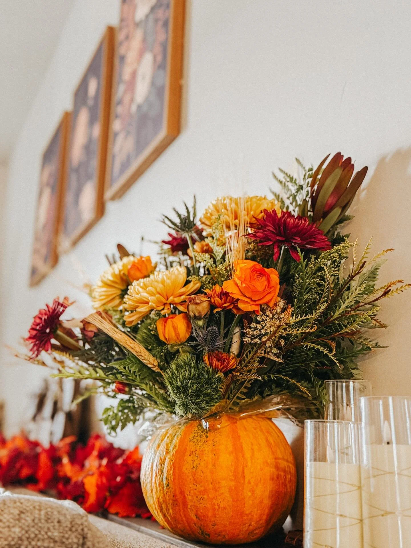 Golden light, gathered blooms, and the scent of something baking in the background.
This centerpiece was made for slow dinners and warm company. 🍂 
 #FallCenterpiece #AutumnBlooms #HarvestSeason #CozyTable