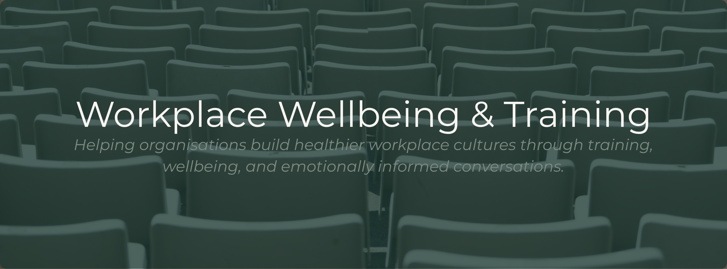 Rows of seating in a training and workshop environment representing workplace wellbeing, leadership development, and organisational learning.
