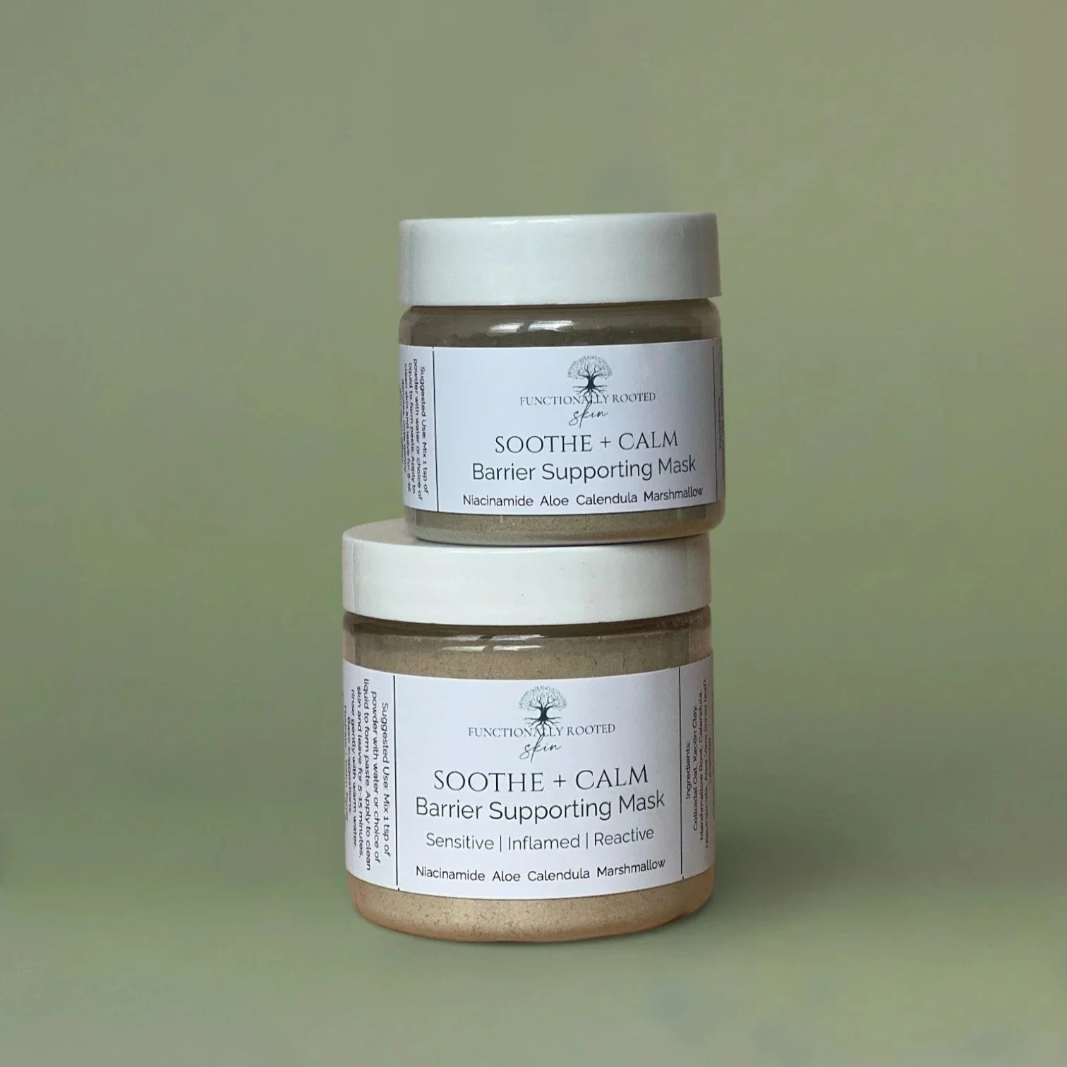 two jars of a calming clay mask to help soothe reactive skin