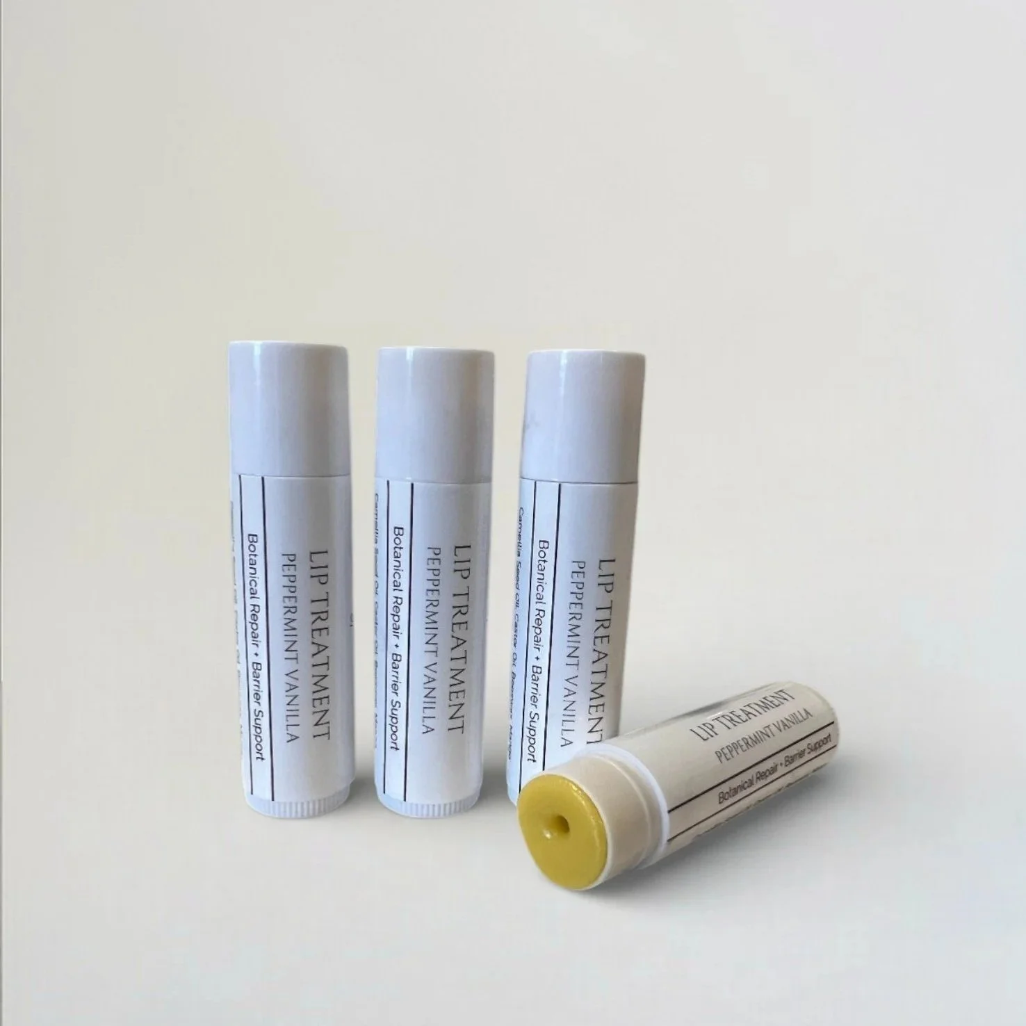 4 lip treatment sticks with calendula co2 to help promote healing and balance of the lips