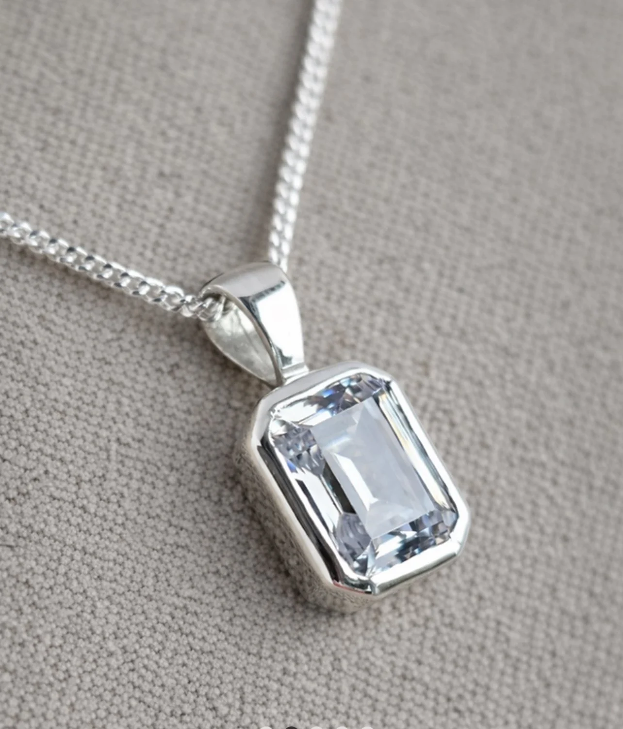 The Unseen Emerald Pendant