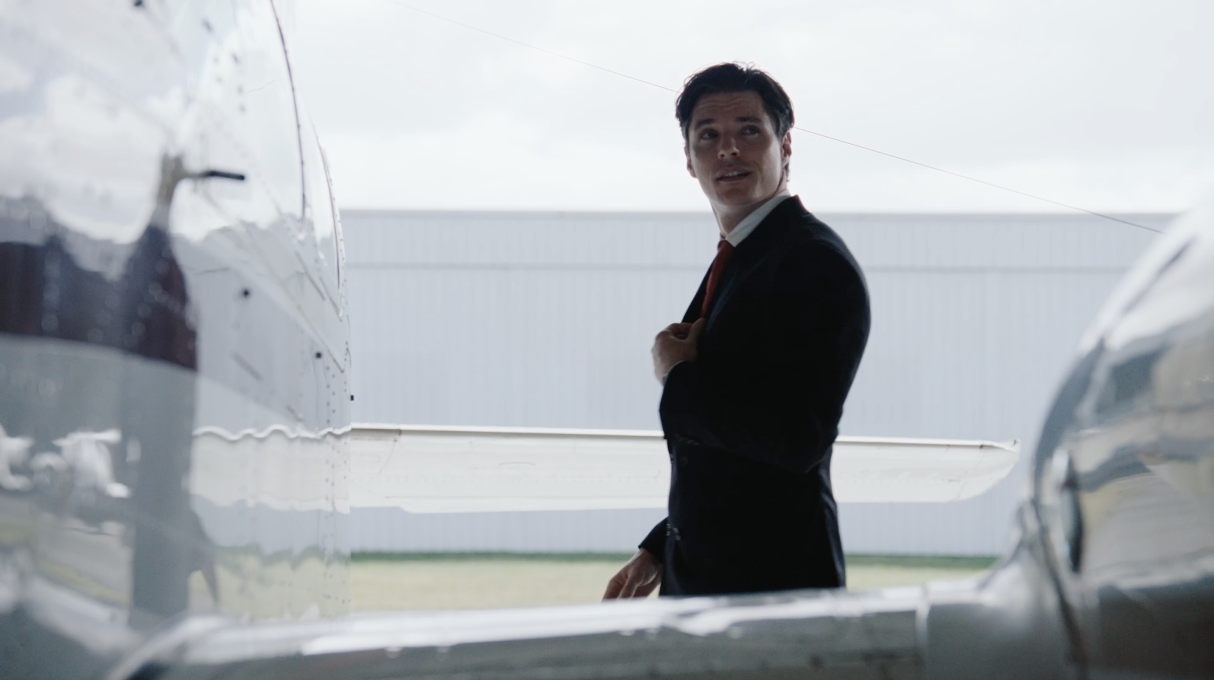 CLIVE´S JET

In a private hangar, a sleek self-important salesman and an aristocratic buyer circle around a luxury jet, competing ego for ego during an attempted sale. 