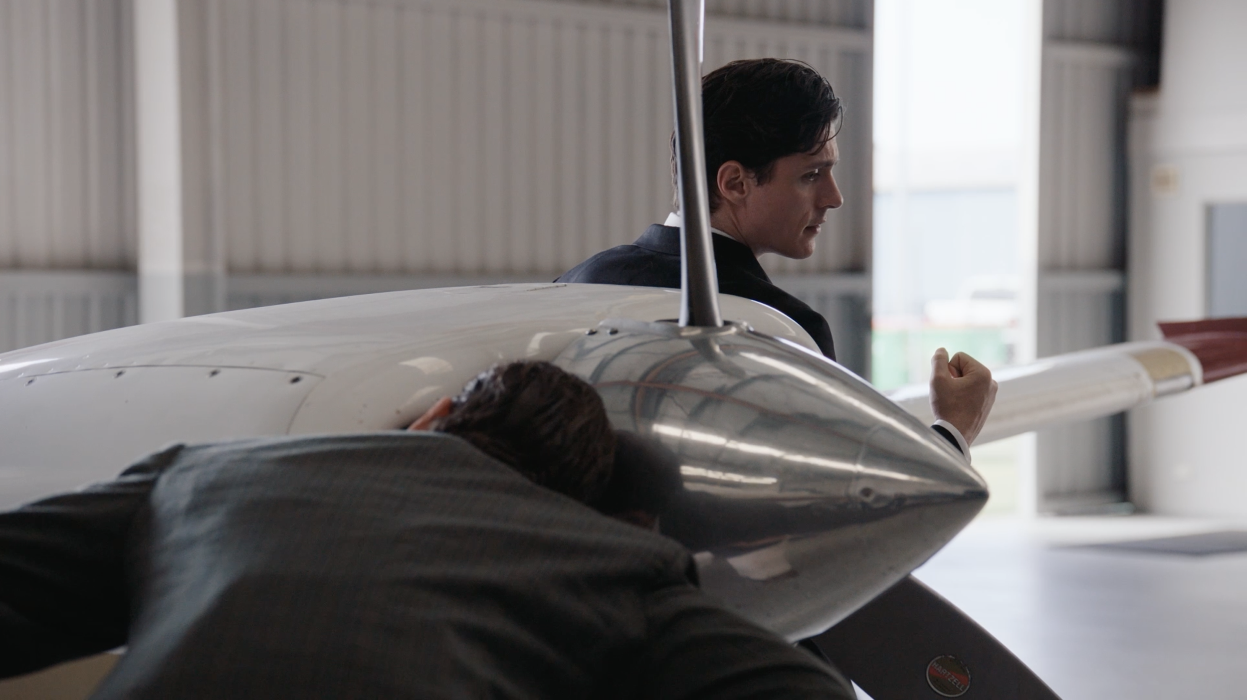 CLIVE´S JET

In a private hangar, a sleek self-important salesman and an aristocratic buyer circle around a luxury jet, competing ego for ego during an attempted sale. 
